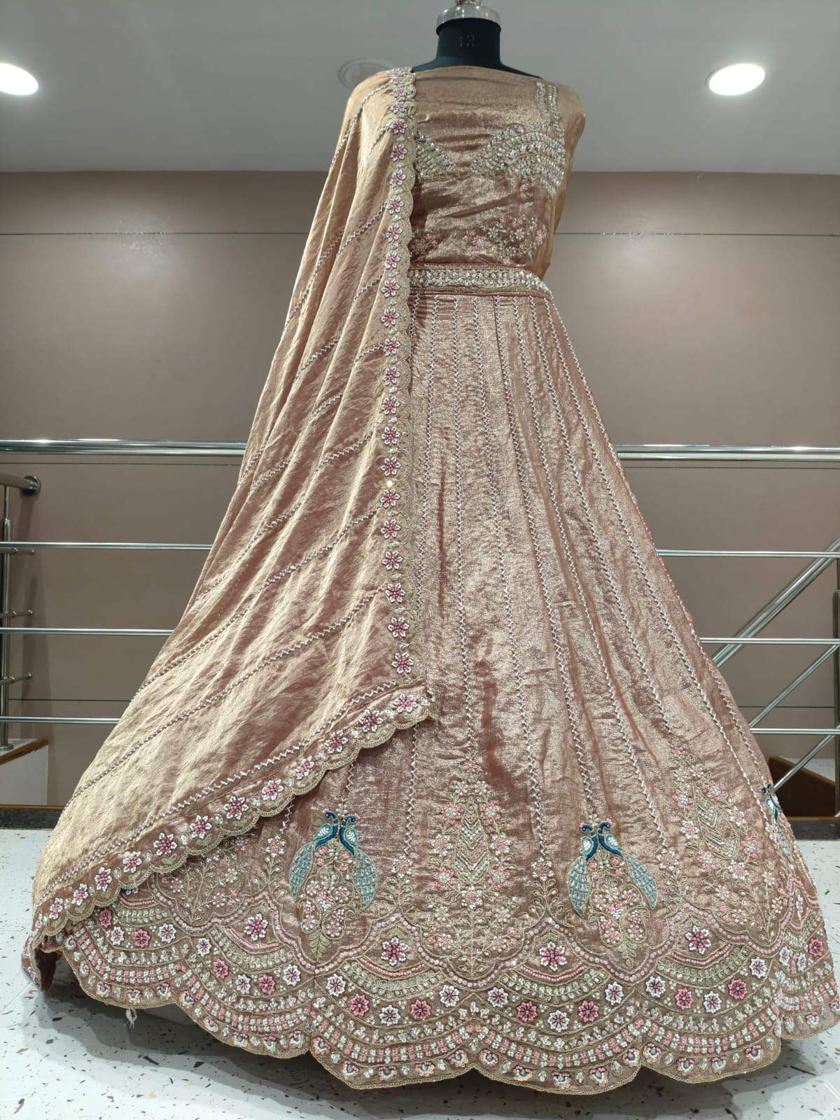 Pretty peacock semi stitched lehenga pink green blue mauve