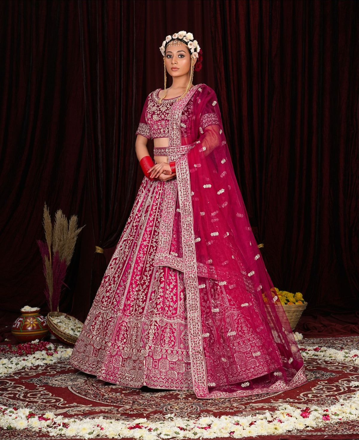 Eye catching Rani pink bridal lehenga