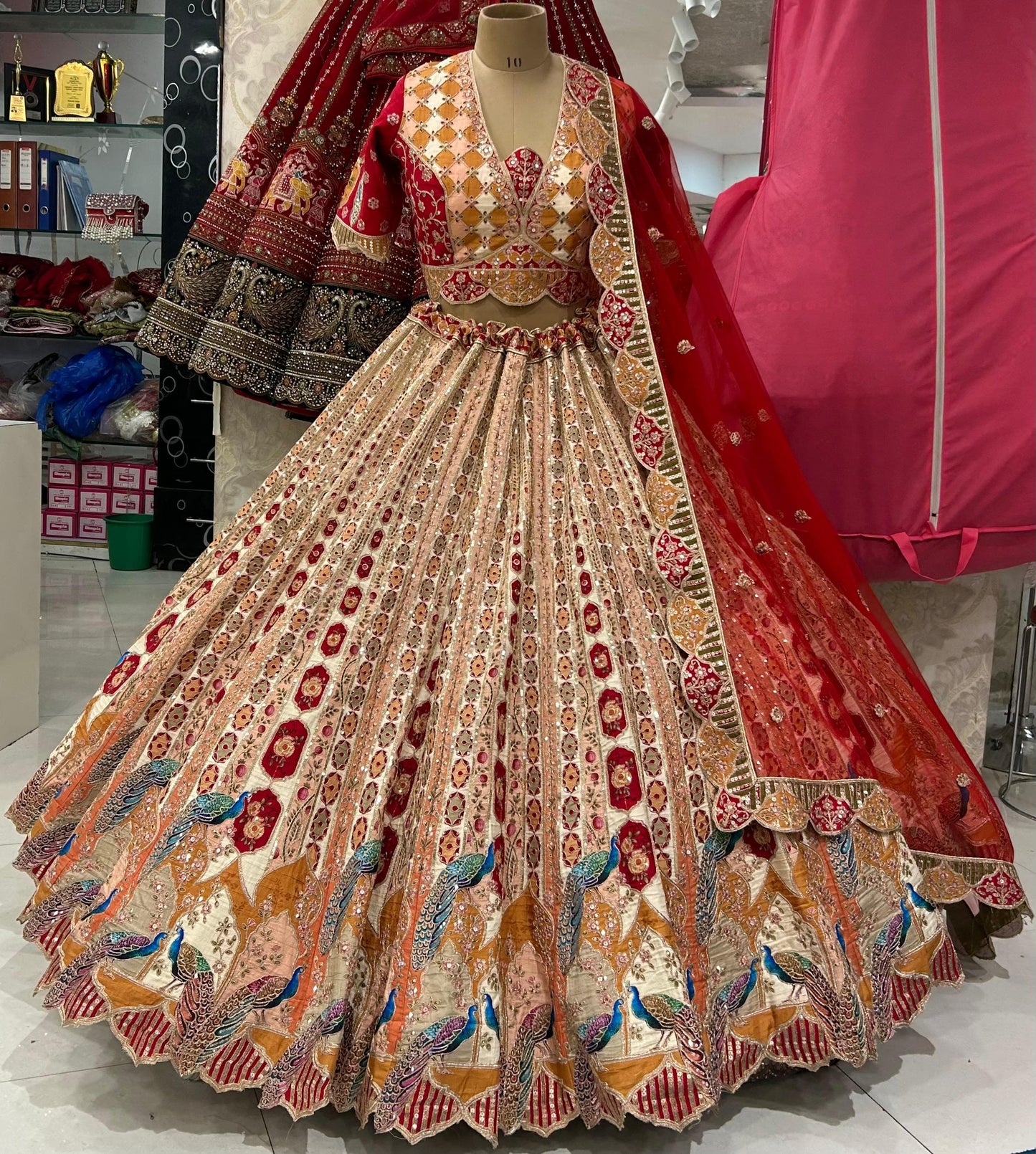 Stunning red white ivory peacock designer Lehenga