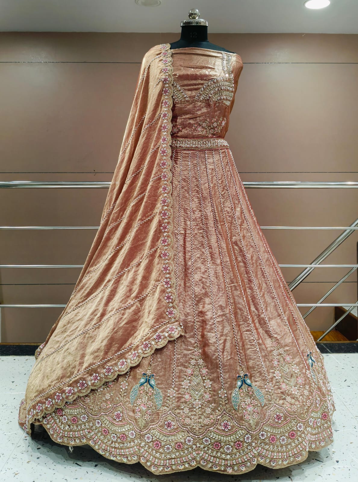 Pretty peacock semi stitched lehenga pink green blue mauve