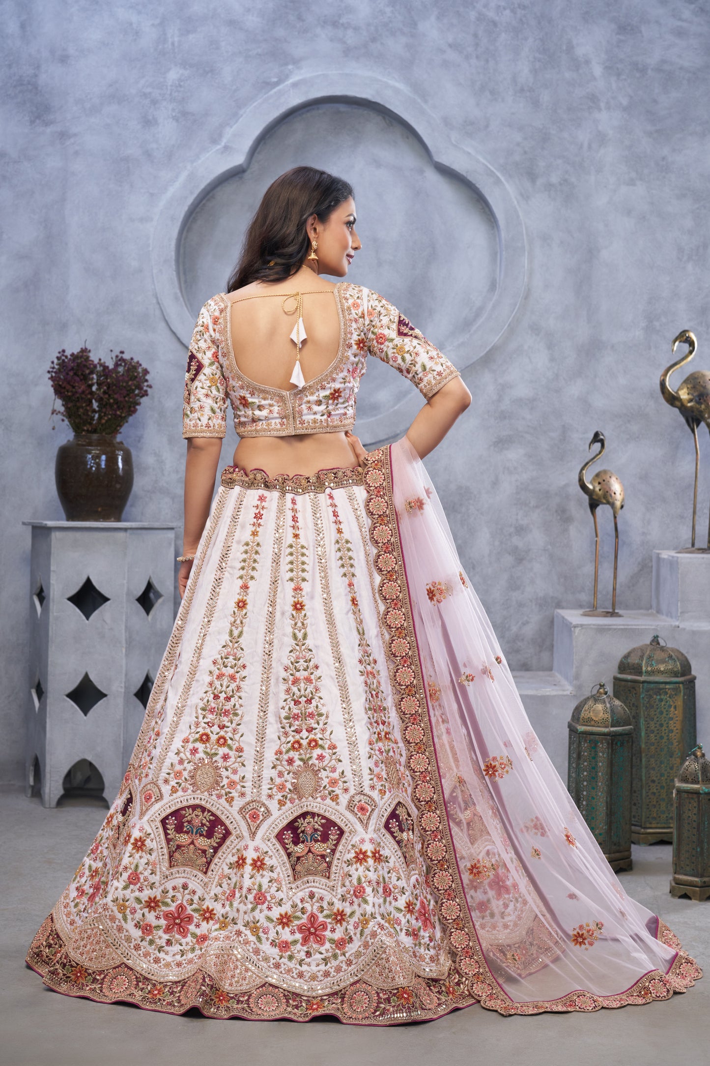 Lavishing light cream lehenga