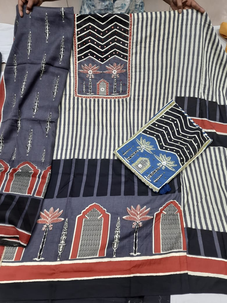 Engaging white black suit dress material (free size)