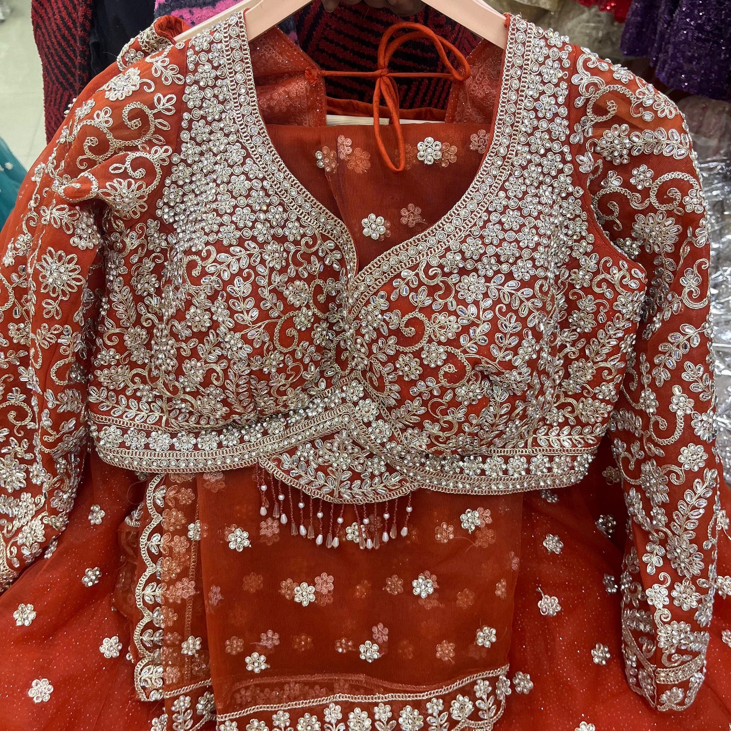 Engaging Rust Orange Booty Crop Top Lehenga