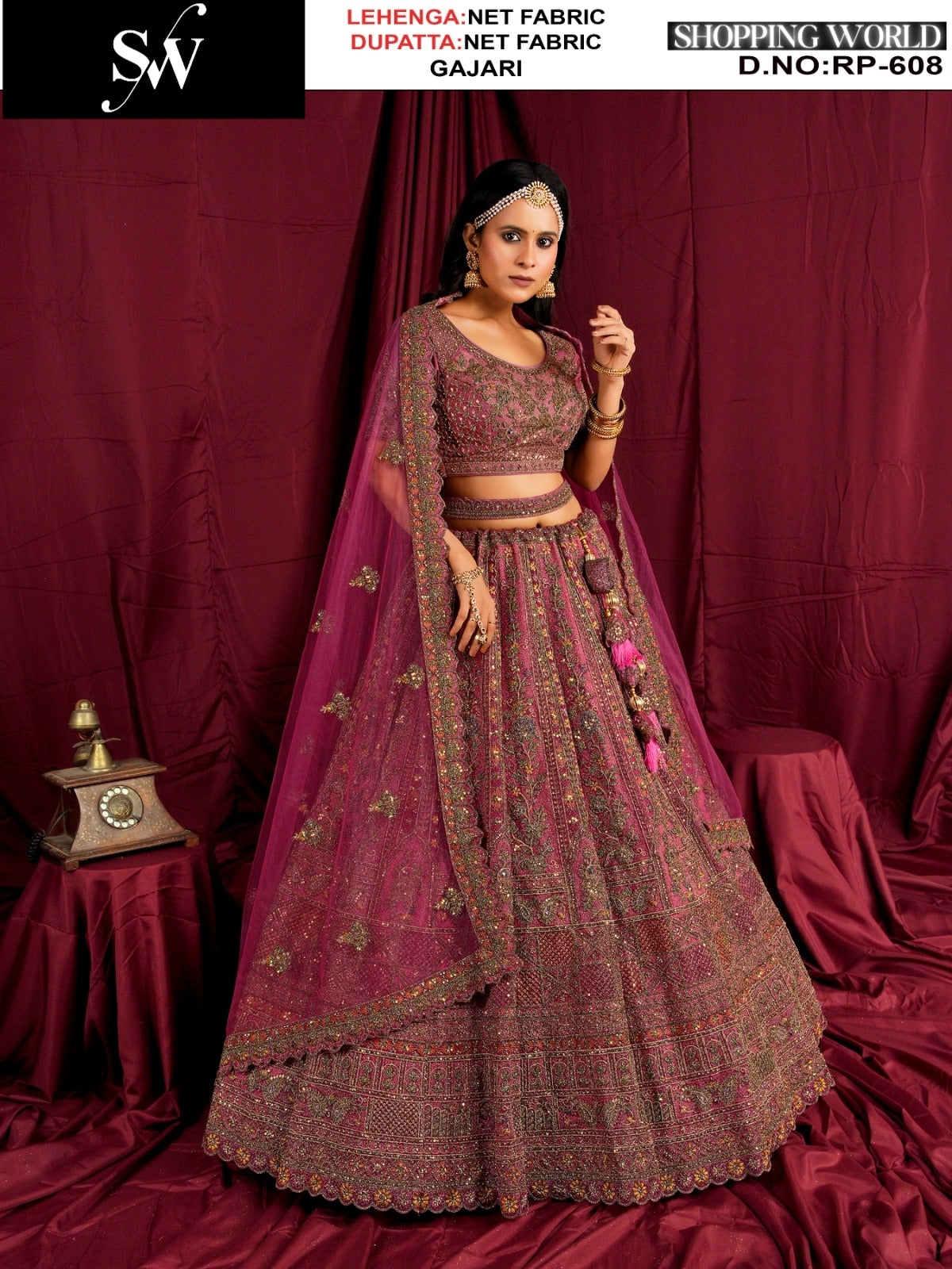 Good looking Rust Net Bridal Lehenga