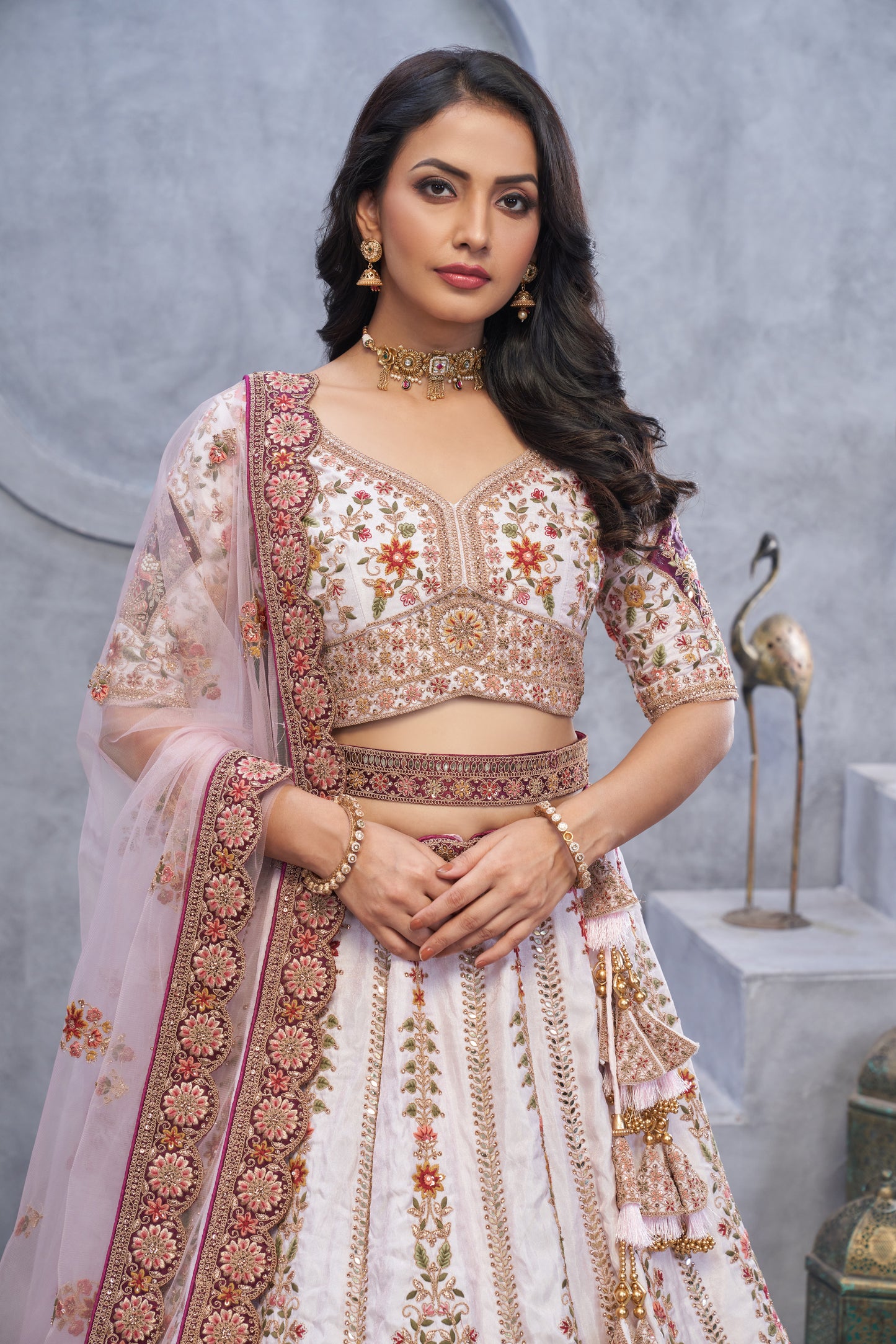Lavishing light cream lehenga